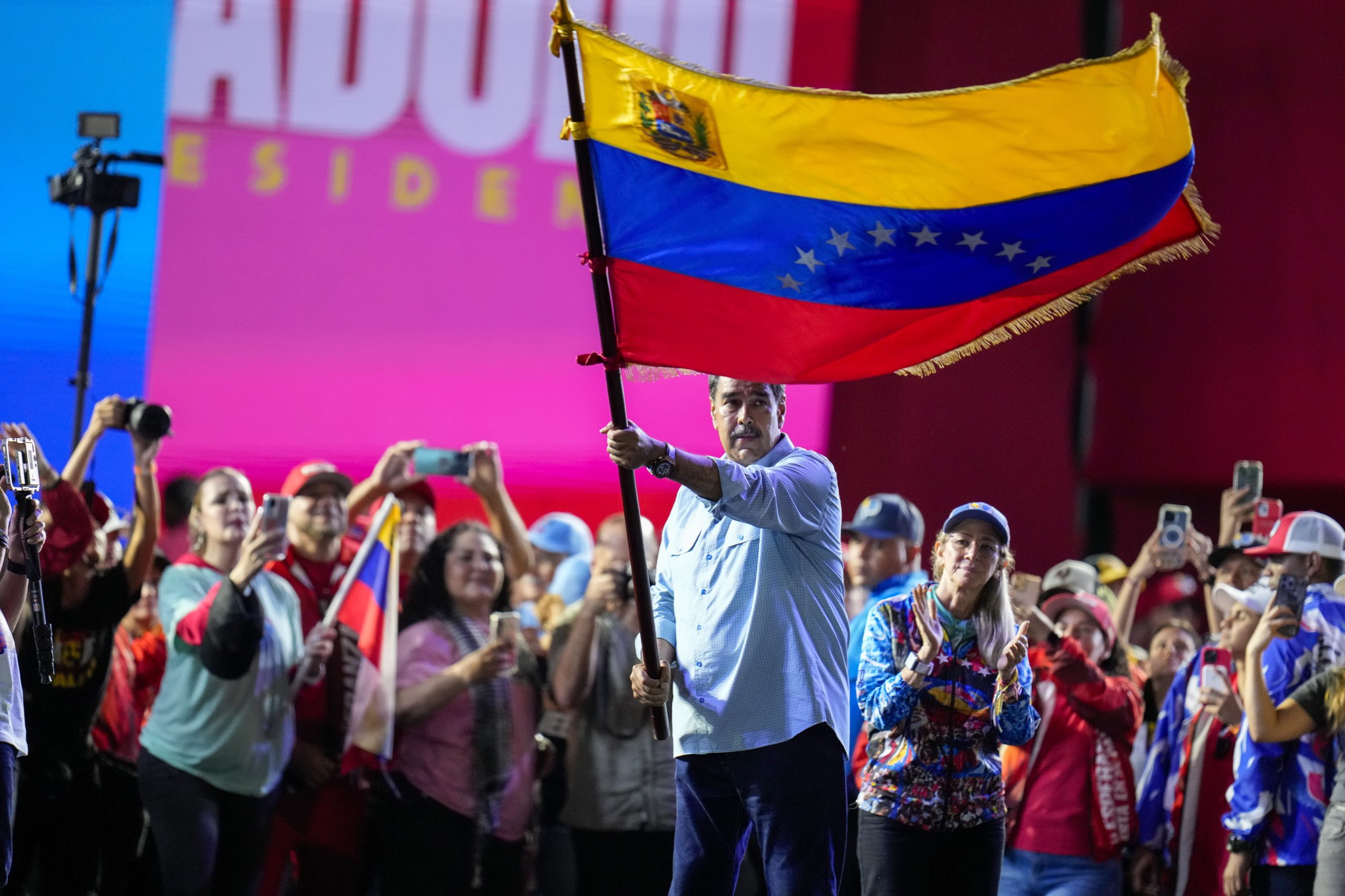 The Latest: Venezuela chooses between another presidential term for