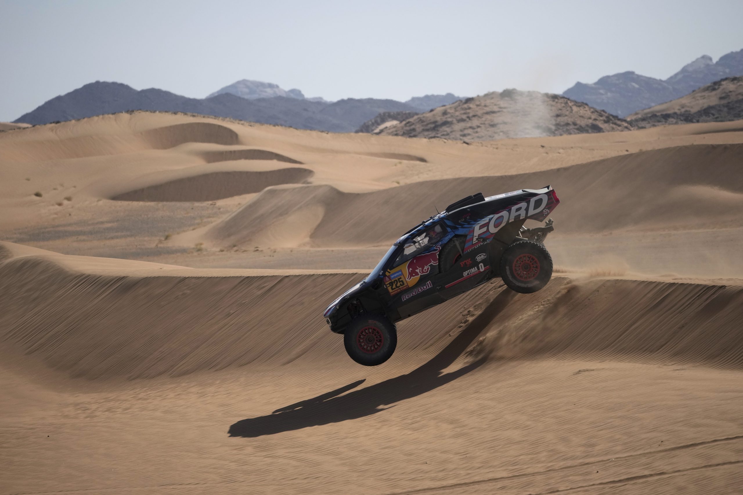 Dakar Rally defending champ Sainz flips in the dunes and is an hour ...